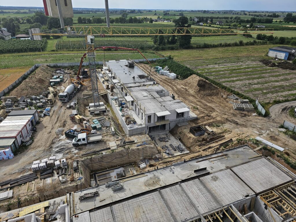 Budowa dwóch budynków wielorodzinnych w czernikowie dla firmy Rembud